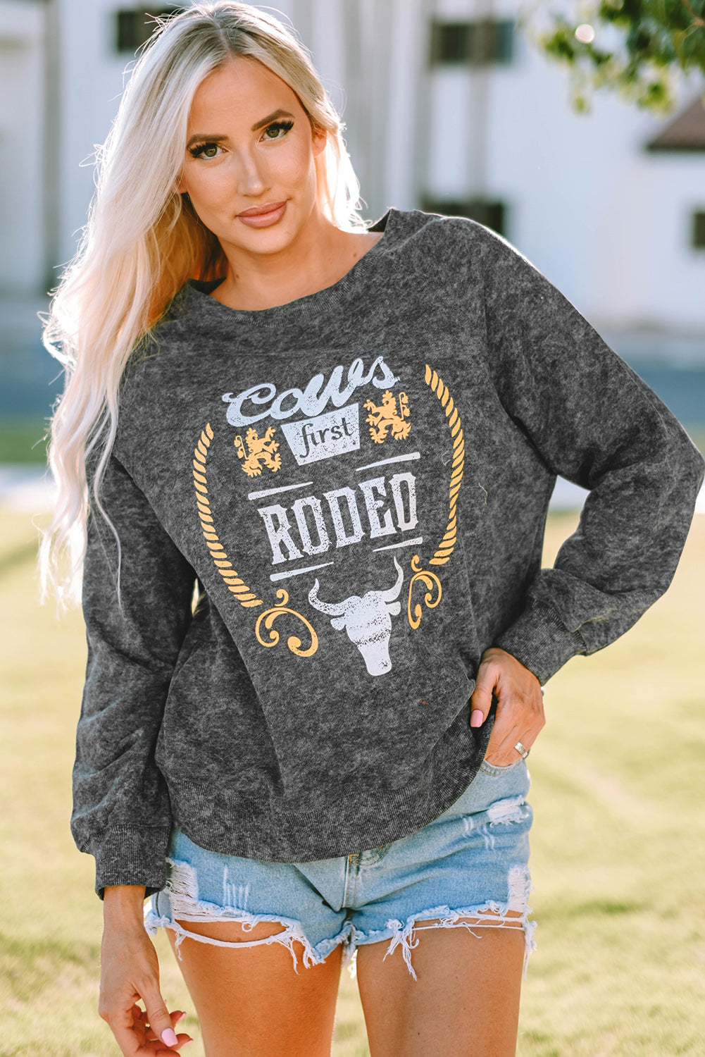 Mineral Washed COW'S FIRST RODEO Round Neck Raglan Sleeve Sweatshirt